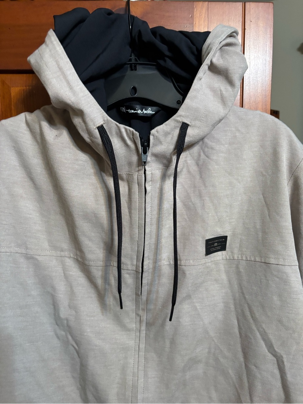 Travis Mathew Men's Zip Hoodie in Light Beige with Black Hood